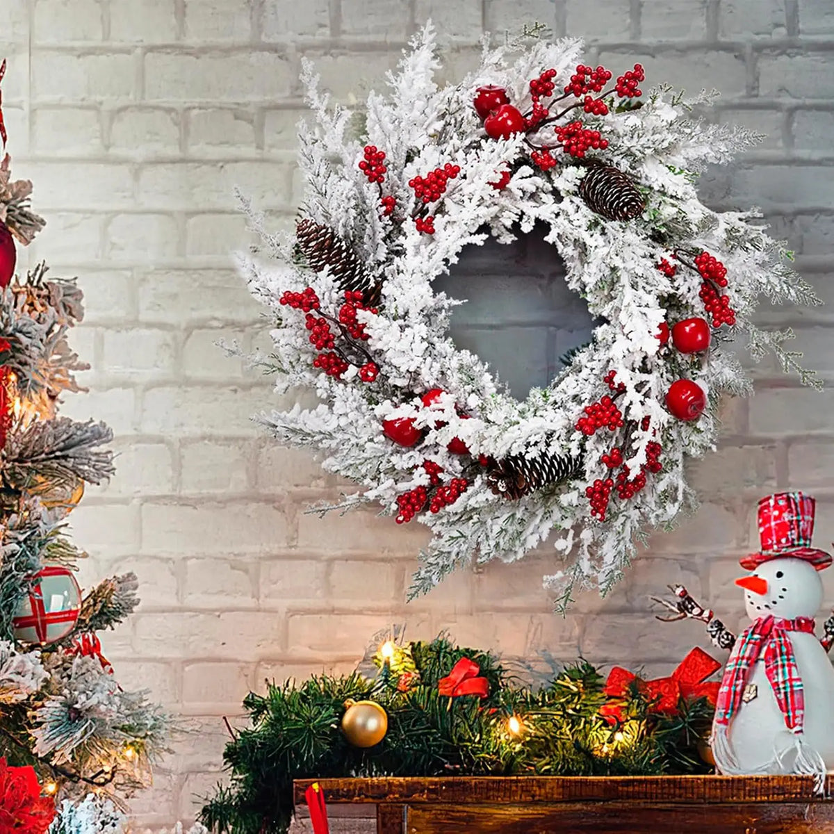 Snow Flocked Christmas Wreath With Red Berries And Pinecones