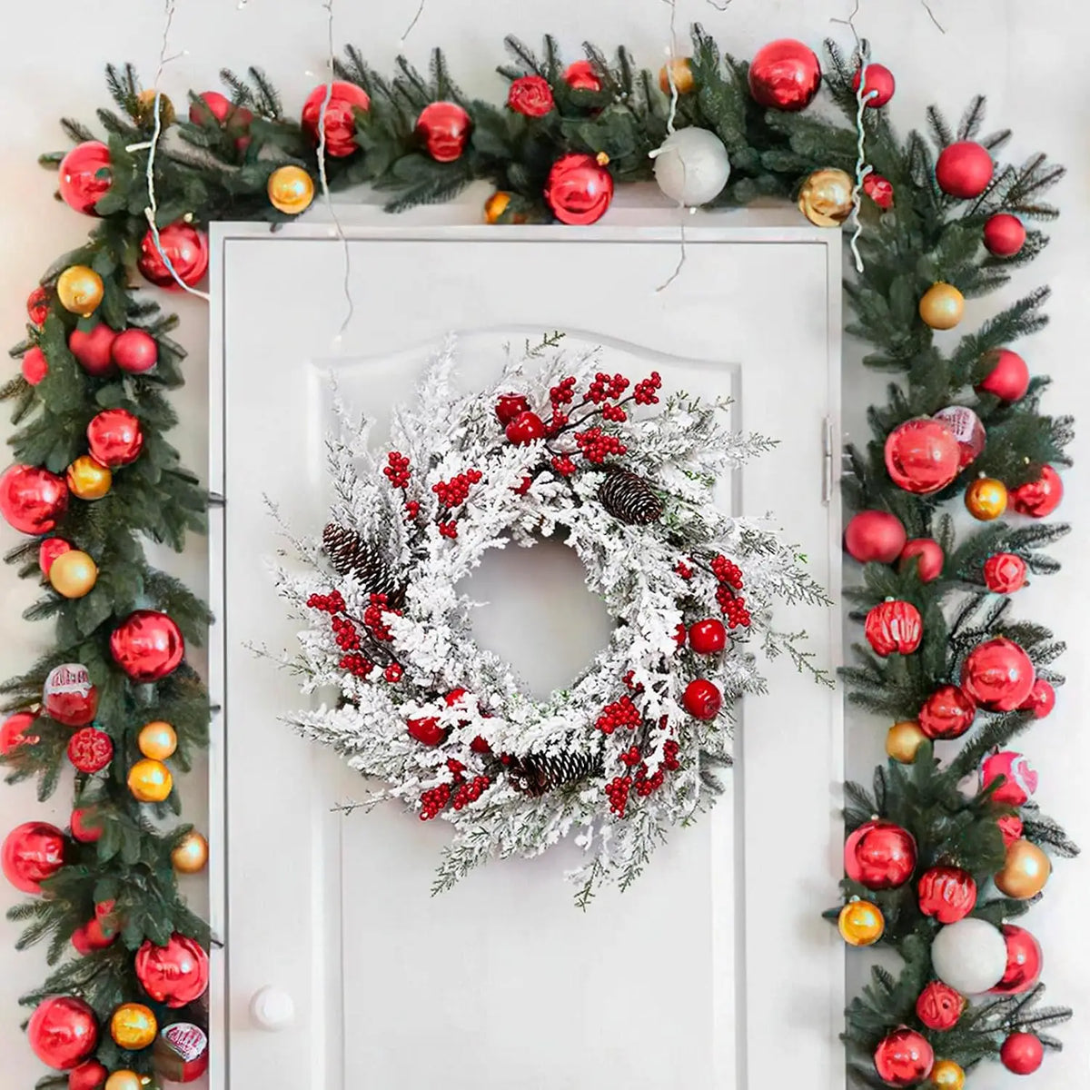 Snow Flocked Christmas Wreath With Red Berries And Pinecones