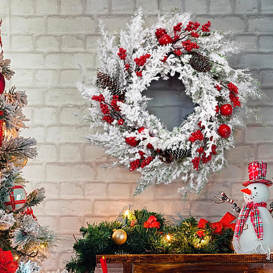 Snow Flocked Christmas Wreath With Red Berries And Pinecones
